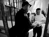 Captain John Murphy receives the outgoing mail from the inmates.  The Bristol County Jail and House of Correction on Ash St. in New Bedford, MA was built in 1829 and is the oldest operating jail in the country.  Almost all of the inmates at the jail are awaiting trial date.  Eighteen of the inmates have been sentenced and are active in the maintenance of the facility.