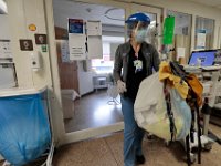 A nurse cleans out a room inside the CCU at St. Luke's Hospital in New Bedford.  PHOTO PETER PEREIRA