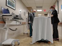 Therapists, Martin Arruda and Nicole Furtado offer a patient some encouragement at St. Luke's Hospital in New Bedford.  PHOTO PETER PEREIRA