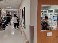 Wilkes Wing nurses and physicians meet in the hallway to discuss their patients and how to proceed for the rest of the day at St. Luke's Hospital in New Bedford.  PHOTO PETER PEREIRA