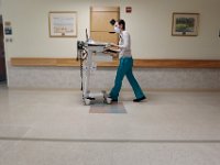 A nurse crosses the Crapo Wing of St. Luke's Hospital in New Bedford.  PHOTO PETER PEREIRA