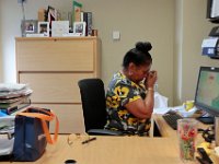 RN Darlene Friedland, wipes tears from her eyes after speaking with a terminal patient at St. Luke's Hospital in New Bedford.   Because family are not allowed to visit due to the COVID-19 lockdown, she is often the last to speak with them at St. Luke's Hospital in New Bedford.  PHOTO PETER PEREIRA