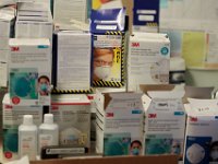 A nurses offices stacked with masks at St. Luke's Hospital in New Bedford.  PHOTO PETER PEREIRA