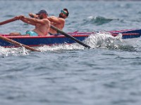 Men representing the Azorean island of Pico row in the XII International Azorean Whaleboat Regatta which took place in Clarke's Cove in New Bedford after a six year hiatus.