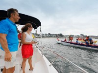 Carlos Manuel da Silveira Ferreira , Mayor of Horta on the Island of Faial and Ana Catarina Terra Brum, Mayor of Lajes do Pico on the island of Pico, cheer on their respective teams during the XII International Azorean Whaleboat Regatta which took place in Clarke's Cove in New Bedford after a six year hiatus.