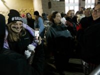 Tracey Bettencourt and daughter Arianna Johnstone, take the opportunity to speak with husband/father Chad Bettencourt a marine stationed in Okinawa Japan as they and fellow shoppers wait for doors to open on Black Friday at Walmart in Dartmouth, MA on November 25, 2016.  PETER PEREIRA/THE STANDARD-TIMES/SCMG : shopping, shop, black friday, madness, economy, holiday, season