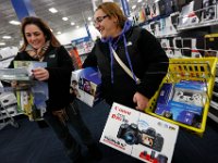 Shoppers have their hands full as they try to grab the best deals at Best Buy in Dartmouth, MA on Black Friday November 25, 2016.  PETER PEREIRA/THE STANDARD-TIMES/SCMG : shopping, shop, black friday, madness, economy, holiday, season