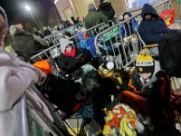 Shoppers try to stay warm as they wait for the Walmart doors to open at 1am on Black Friday in Dartmouth, MA.  [ PETER PEREIRA/THE STANDARD-TIMES/SCMG ]