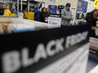 Shoppers rush into Best Buy as doors open at 1am on Black Friday in Dartmouth, MA.  [ PETER PEREIRA/THE STANDARD-TIMES/SCMG ]