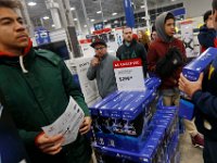 Shoppers look to take advantage of the deals available at Best Buy after doors opened at 1am on Black Friday in Dartmouth, MA.  [ PETER PEREIRA/THE STANDARD-TIMES/SCMG ]