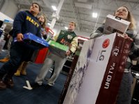 Shoppers wait to cash out on their purchases at Best Buy on Black Friday in Dartmouth, MA.  [ PETER PEREIRA/THE STANDARD-TIMES/SCMG ]