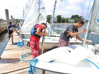 Instructors and junior instructors of the Community Boating Center in New Bedford prepare for the upcoming summer programs, which begins on Monday, with a sail off in Clarke's Cove.   [ PETER PEREIRA/THE STANDARD-TIMES/SCMG ]