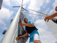 Instructors and junior instructors of the Community Boating Center in New Bedford prepare for the upcoming summer programs, which begins on Monday, with a sail off in Clarke's Cove.   [ PETER PEREIRA/THE STANDARD-TIMES/SCMG ]