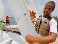 Instructors and junior instructors of the Community Boating Center in New Bedford prepare for the upcoming summer programs, which begins on Monday, with a sail off in Clarke's Cove.   [ PETER PEREIRA/THE STANDARD-TIMES/SCMG ]