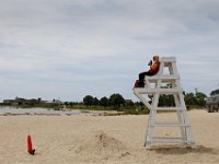 New Bedford lifeguards monitoring the south end beaches go through their morning ritual of stretching, running, swimming and putting out the signs, before monitoring the beaches, as swimming season officially begins.   [ PETER PEREIRA/THE STANDARD-TIMES/SCMG ]