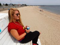 New Bedford lifeguards monitoring the south end beaches go through their morning ritual of stretching, running, swimming and putting out the signs, before monitoring the beaches, as swimming season officially begins.   [ PETER PEREIRA/THE STANDARD-TIMES/SCMG ]