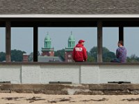 New Bedford lifeguards monitoring the south end beaches go through their morning ritual of stretching, running, swimming and putting out the signs, before monitoring the beaches, as swimming season officially begins.   [ PETER PEREIRA/THE STANDARD-TIMES/SCMG ]