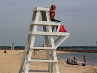 New Bedford lifeguards monitoring the south end beaches go through their morning ritual of stretching, running, swimming and putting out the signs, before monitoring the beaches, as swimming season officially begins.   [ PETER PEREIRA/THE STANDARD-TIMES/SCMG ]