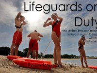 New Bedford lifeguards monitoring the south end beaches go through their morning ritual of stretching, running, swimming and putting out the signs, before monitoring the beaches, as swimming season officially begins.   [ PETER PEREIRA/THE STANDARD-TIMES/SCMG ]