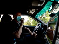 Bill Sullivan, paramedic supervisor, responds to a call of a man having difficulty breathing in the north end of New Bedford. Despite over 12,000 COVID-19 related calls since March, only one part-time EMT has tested positive for the virus.  PHOTO PETER PEREIRA