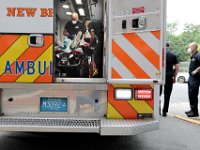 New Bedford EMT's Jason Stone and Jason Kirby tend to an overdose patient in the back of the ambulance before transporting him to the hospital. Paramedic David Branco and Jason Kirby resuscitate an overdose patient in downtown New Bedford. Despite over 12,000 COVID-19 related calls since March, only one part-time EMT has tested positive for the virus.  PHOTO PETER PEREIRA