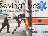 New Bedford EMT, Jason Kirby, wheels an overdose patient into the ambulance before bringing him to the hospital. Paramedic David Branco and Jason Kirby resuscitate an overdose patient in downtown New Bedford. Despite over 12,000 COVID-19 related calls since March, only one part-time EMT has tested positive for the virus.  PHOTO PETER PEREIRA