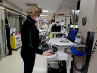 Alexis Plante, clinical tech, takes a look at one of her patients profile in the ED at the Charlton Memorial Hospital in Fall River.  PHOTO PETER PEREIRA