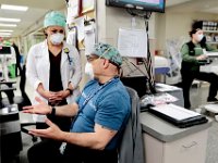 Seanna Zimmerman, emergency services lead, speaks with Bill Tavares, resource nurse, in the ED at the Charlton Memorial Hospital in Fall River.  PHOTO PETER PEREIRA