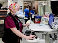 Alexandra Moscato, RN, inputs data for the patient she is treating at the Charlton Memorial Hospital in Fall River.  PHOTO PETER PEREIRA