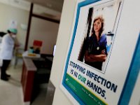A sign on the wall reminds nurses to wash their hands at the Charlton Memorial Hospital in Fall River.  PHOTO PETER PEREIRA