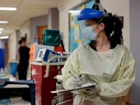 Megan Sweeney RN, documents at what time medication was given to the COVID-19 positive patient at the Charlton Memorial Hospital in Fall River.  PHOTO PETER PEREIRA