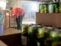 Maureen Costa, dietary aide, restocks the soda in a small fridge at the nurse station in the ICU at Tobey Hospital in Wareham.  PHOTO PETER PEREIRA