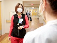 Tara Rosa, team leader, speaks with one of her nurses at Tobey Hospital in Wareham.  PHOTO PETER PEREIRA