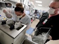 Krissany Desmarais, lead tech, and Mark Daudelin, tech, check the plasma thawing machine inside the lab at Tobey Hospital in Wareham.  PHOTO PETER PEREIRA