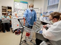 (l to r) Wanda Johnson, Marsia Halligan, phlebotomist, and Carmen Fitzgerald, check the various tubes in the lab at Tobey Hospital in Wareham.  PHOTO PETER PEREIRA