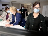 Radiology department staff determine if an incoming patient is COVID-19 positive (and if they need extra protection) before bringing him in for an X-Ray at Tobey Hospital in Wareham.  PHOTO PETER PEREIRA