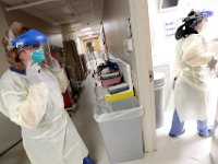 (l to r) Betty Chandler, RN and Katelin Arruda, nurse tech, enter a room with a newly admitted patient in the ER at Tobey Hospital in Wareham.  PHOTO PETER PEREIRA