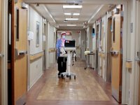 Malinda Betelho, RN, walks the halls of SK2 at Tobey Hospital in Wareham.  PHOTO PETER PEREIRA