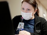 Stephanie Ferreira, RN, focuses on her patient information at Tobey Hospital in Wareham.  PHOTO PETER PEREIRA