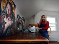 Local artist Deborah Macy takes a coffee break during a lesson with David Danis, who has Down syndrome, at her studio in New Bedford. [ PETER PEREIRA/THE STANDARD-TIMES/SCMG ]