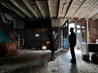 New Bedford firefighter and WHALE project Committee member, Scott Almeida,  and Rachel Alison, Historic Projects Manager for WHALE, tour the former Hillman Street fire station at the intersection of Hillman Street and County Street in New Bedford for a tour.  The old fire station is scheduled to be converted into nine apartments.  [ PETER PEREIRA/THE STANDARD-TIMES/SCMG ]