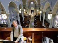 The funerary procession can be seen below as Organist Barry Turley plays a somber classical piece duiring the Funeral Mass of longtime New Bedford police officer Octavio C. "Tacky" Pragana, at the St. Joseph-St. Therese Church on Acushnet Avenue in New Bedford, MA on March 19, 2019.