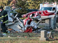 New Bedford fire and police respond to the scene of a plane crash at Rural Cemetery in New Bedford, MA on November 4, 2019. The pilot of the aircraft died in the crash.