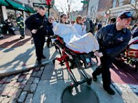 Honora Scaduto, a Bristol Community College student, is taken by New Bedford EMS for treatment after emergency responders received reports of a strong odor at the Bristol Community College campus on Purchase Street in New Bedford, MA on November 21, 2019.