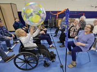Pauline Faria, 95, joins fellow seniors in playing sitting volleyball at the Wareham Council on Aging inside the Multi-Service Center on Route 6 in Wareham.  [ PETER PEREIRA/THE STANDARD-TIMES ]