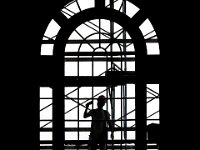 Darwin Lopez paints the mullions between glass panes on the iconic extra large windows of the Lagoda room at the Whaling Musem in New Bedford as part of extensive exterior restoration.  [ PETER PEREIRA/THE STANDARD-TIMES/SCMG ]