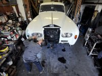 Paulo Carmo works on restoring a 1963 Rolls Royce which will be used by Salon Salon Limousine in Westport.  [ PETER PEREIRA/THE STANDARD-TIMES ]