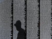 Vietnam veteran, Armand Perrault 69-70, looks for his friends name on The Moving Wall, a one half-size replica of the Vietnam Veterans Memorial in Washingont DC.  The Moving Wall is cuttently on display at Highland Park in Attleboro.  [ PETER PEREIRA/THE STANDARD-TIMES/SCMG ]