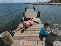 Joel Brown his girlfriend Meridith Winn and her son Christian Winn, 7, enjoy a perfect afternoon on a pier in the south end of New Bedford.  [ PETER PEREIRA/THE STANDARD-TIMES/SCMG ]