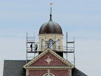 Workmen install the staging around the iconic cupola of the Whaling Museum as part of a new phase of repairs underway at the downtown New Bedford landmark.  [ PETER PEREIRA/THE STANDARD-TIMES ]